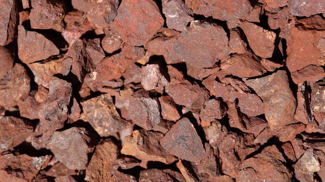 Iron ore resumes drop on challenging outlook after trade boost